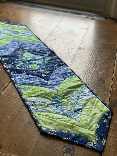 Curvacious Table Runner Kit featuring Free Motion Fantasy by Amanda Murphy available in Canada at The Quilt Store