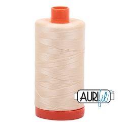 Aurifil 2123 Butter 50 wt available at The Quilt Store