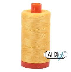Aurifil 1135 Pale Yellow 50 wt available at The Quilt Store